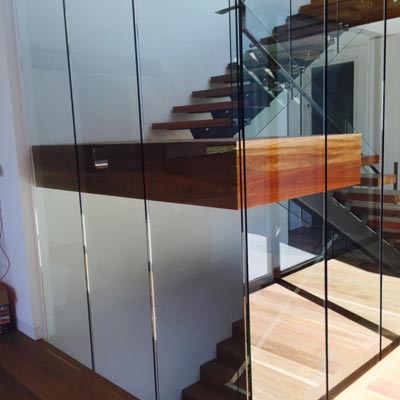 Internal stair with glass balustrade